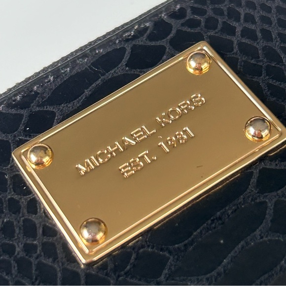 Michael Kors zip around wristlet phone wallet black gold hardware
